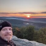 Mike Bristol on a hilltop