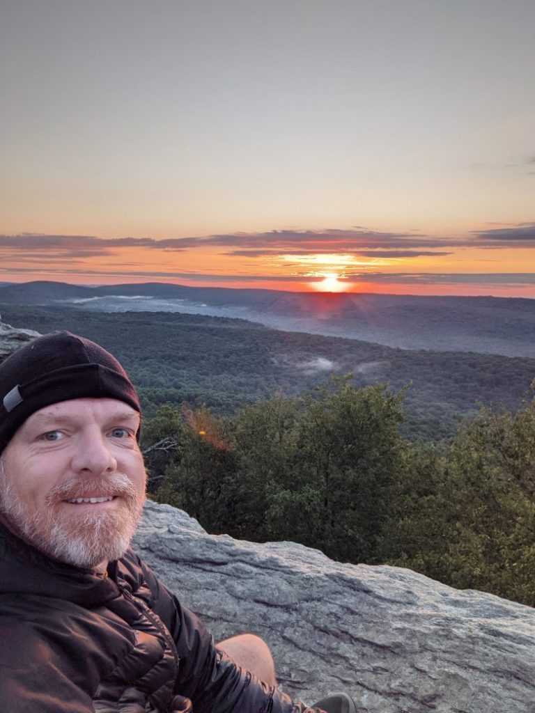 Mike Bristol on a hilltop