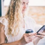 Business woman using business texting from UpLync