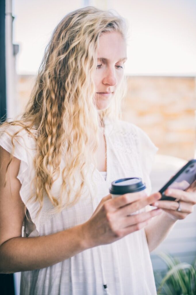 Business woman using business texting from UpLync